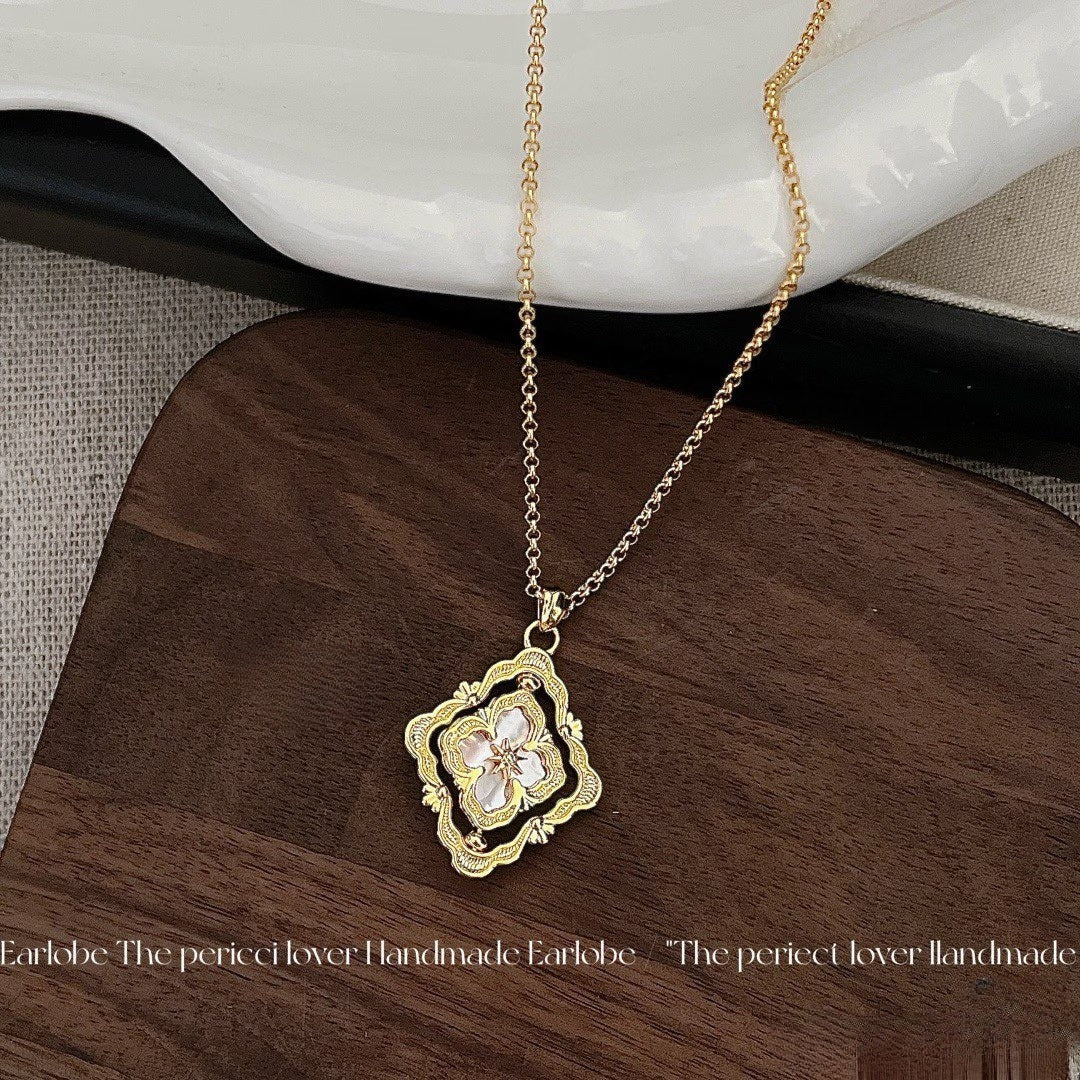 "Ethereal Spinner" Pink Mother-of-Pearl Clover Necklace – A Rotating Token of Luck