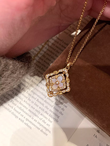 "Ethereal Spinner" Pink Mother-of-Pearl Clover Necklace – A Rotating Token of Luck