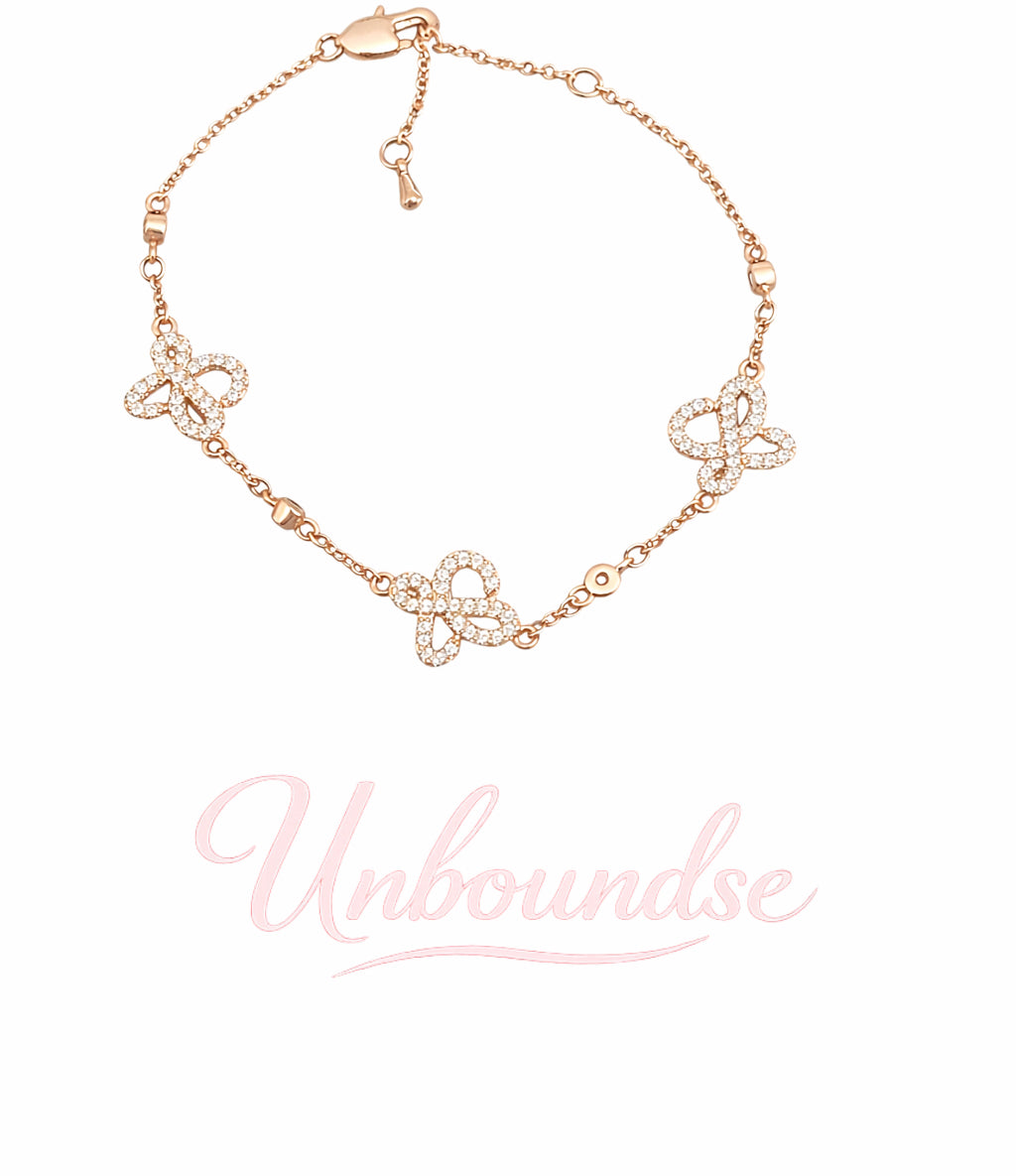 Zartes, 18 Karat vergoldetes Schmetterlingskettenarmband in Roségold 