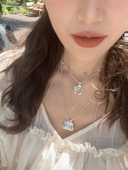 Little Secret Mini Bag Necklace with a Convertible Wrap Chain