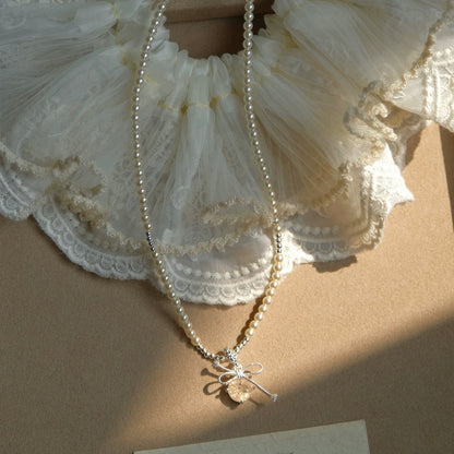 Ivory Pearl Bow Pendant Necklace