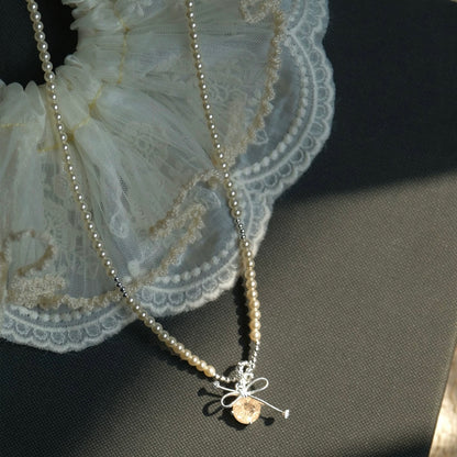 Ivory Pearl Bow Pendant Necklace