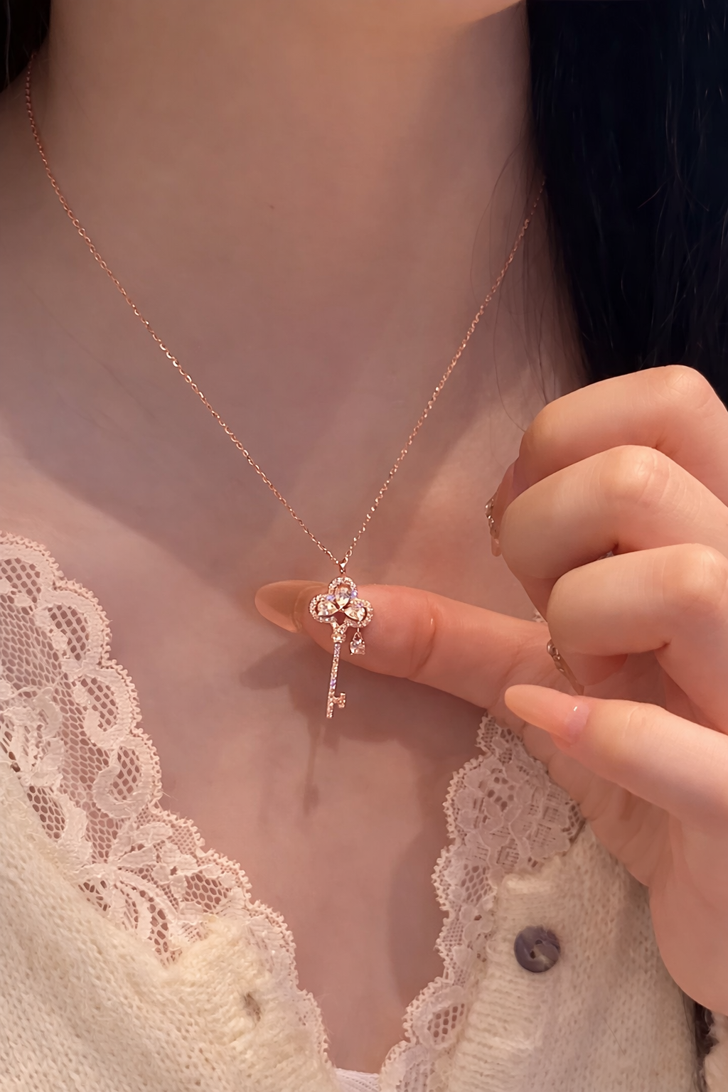 Halskette mit Schlüsselanhänger aus Roségold, 18 Karat vergoldet