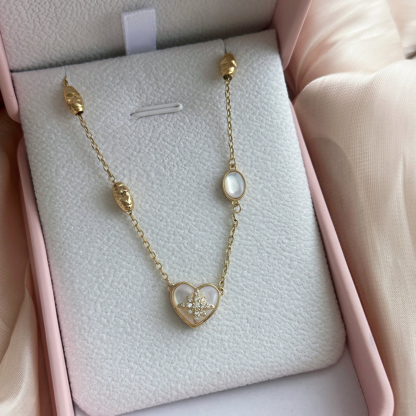 Herzförmige Muschelkette, 18 Karat vergoldet