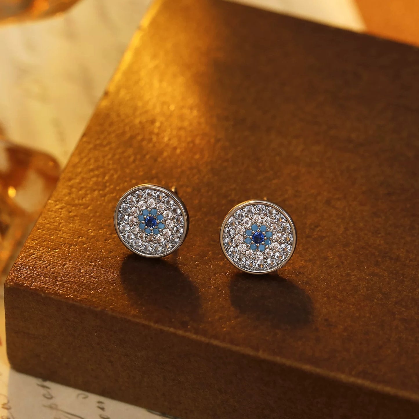 Dainty Evil Eye Studs: Gradient Blue Micro-Pave Zirconia in Fine Brass