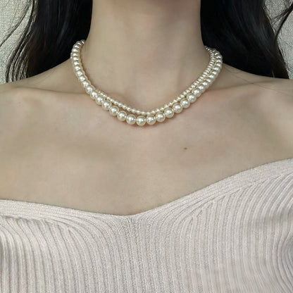 Doppelsträngige Perlenkette, 18 Karat vergoldet