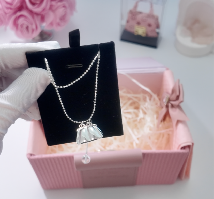 Little Secret Mini Bag Necklace with a Convertible Wrap Chain