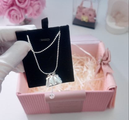 Little Secret Mini Bag Necklace with a Convertible Wrap Chain