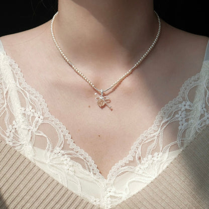 Ivory Pearl Bow Pendant Necklace