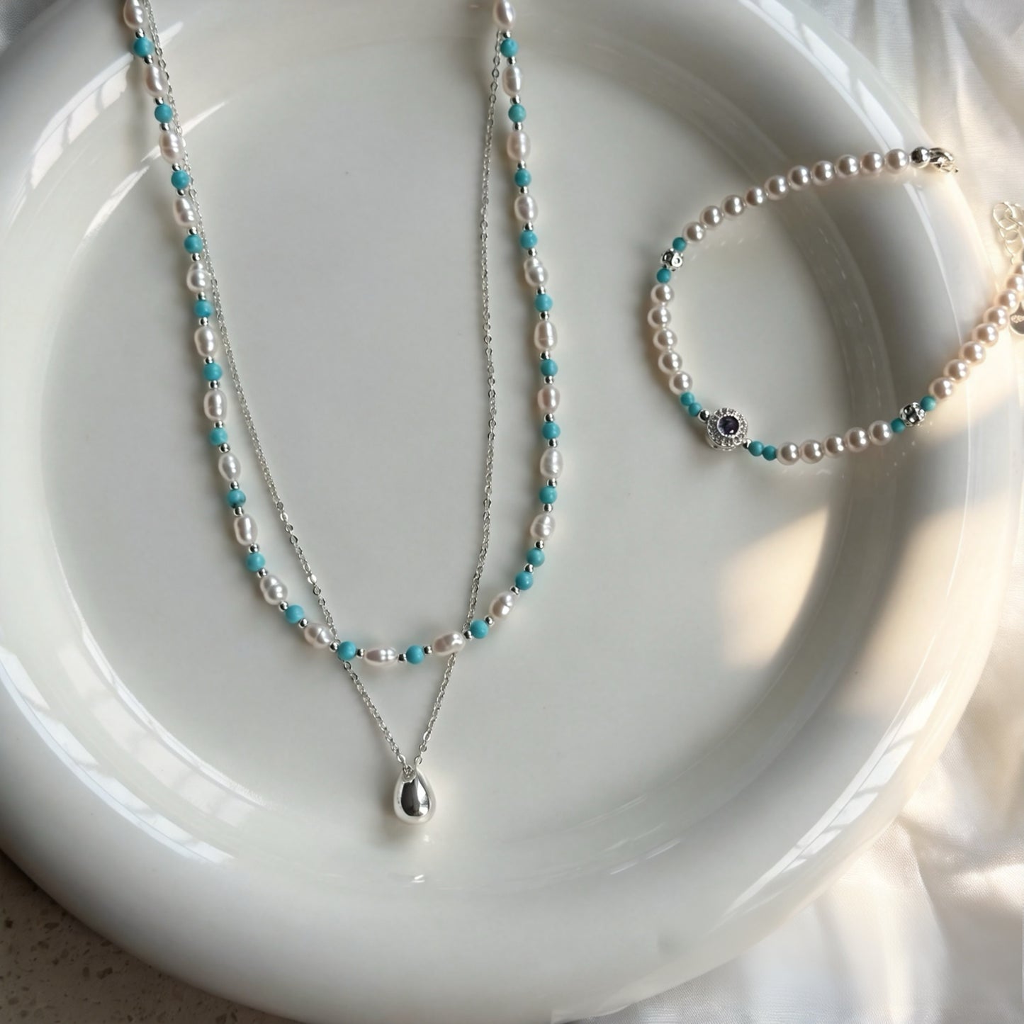 Set aus Halskette und Armband mit Süßwasserperlen und Türkis